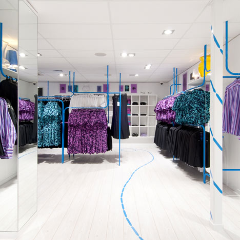 Air New Zealand Clothes Hangar Store by Gascoigne Associates